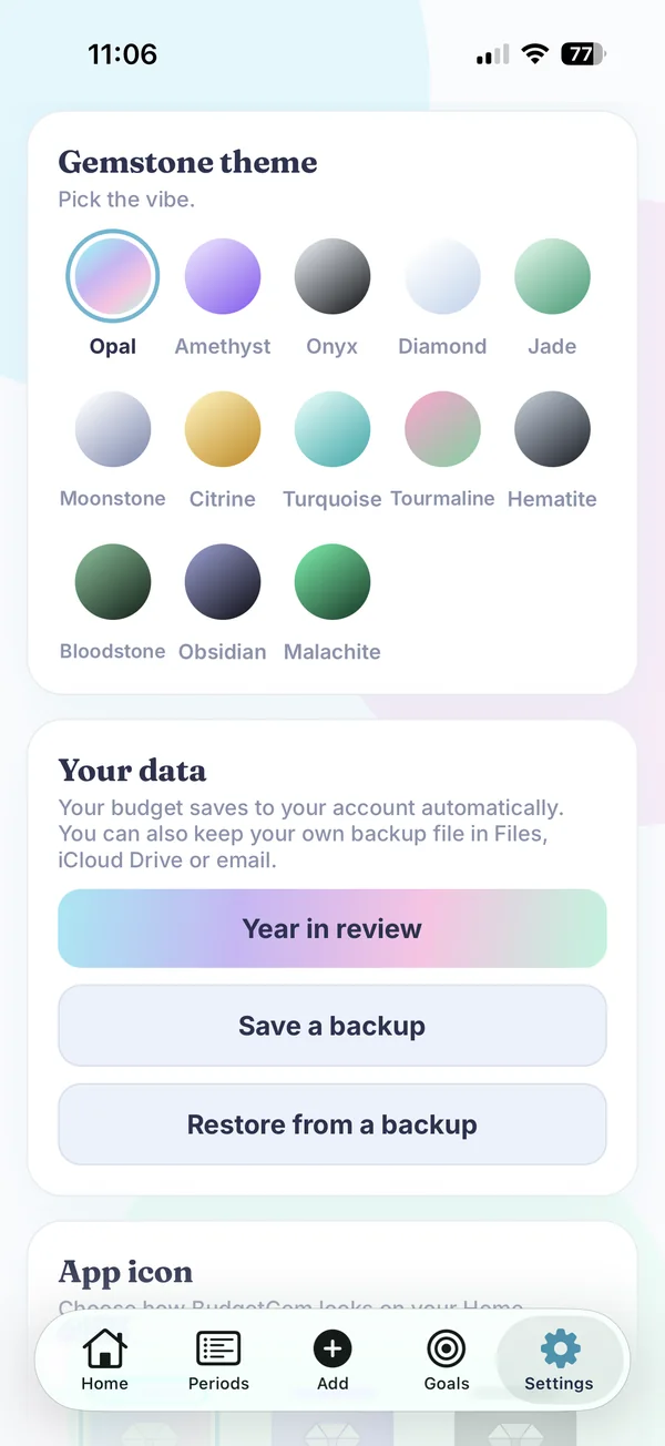 Settings screen with 13 gemstone themes, including Opal, Amethyst, Onyx, Diamond and Jade, plus Year in review and backup buttons